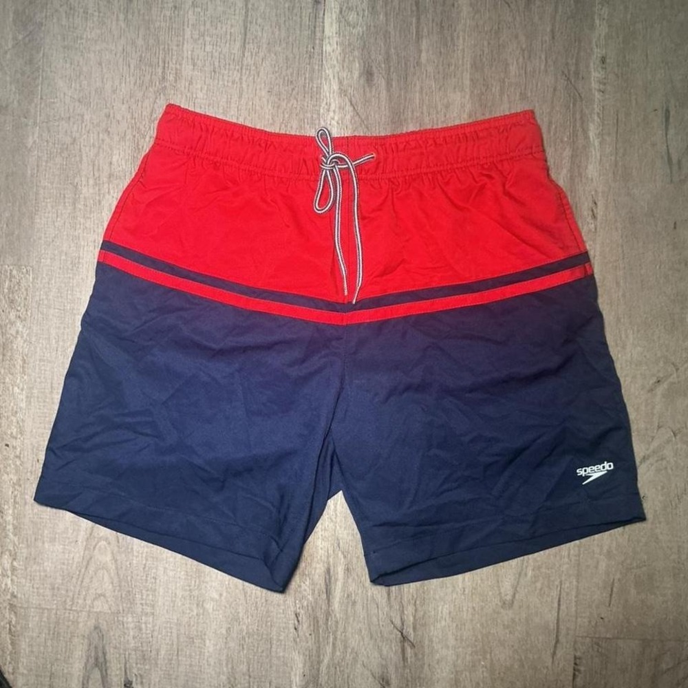 Navy blue and red Speedo swim shorts